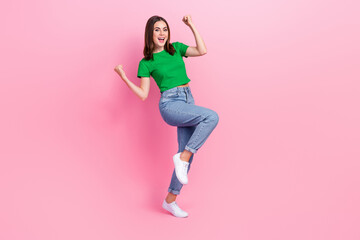 Sticker - Full length photo of sweet lucky lady dressed green t-shirt screaming rising fists empty space isolated pink color background