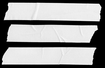 Wall Mural - Three white Blank painter tape stickers isolated on black background