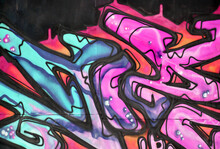 Colorful Background Of Graffiti Painting Artwork With Bright Aerosol Strips And Beautiful Colors. Old School Street Art Piece Made With Aerosol Spray Paint Cans. Contemporary Youth Culture Backdrop