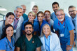 © Halfpoint - Portrait of happy doctors, nurses and other medical staff in hospital.