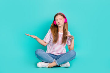 Sticker - Full length photo of shiny adorable girl dressed pink t-shirt dancing listening songs isolated teal color background