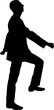 A silhouette of a man climbs the stairs. Business concept