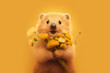 Bear with flowers over yellow background, postcard for 8 march. Generative Ai