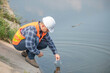 © reewungjunerr - Environmental engineers inspect water quality,Bring water to the lab for testing,Check the mineral content in water and soil,Check for contaminants in water sources.