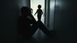 © Marco - Depressed father being consoled by son sitting in corridor in silhouette. Child hugging sad parent during crisis