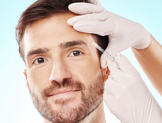 Sticker - Portrait, man and needle for cosmetics, dermatology and beauty on blue studio background. Face, male and gentleman with skincare, injection and plastic surgery with botox, gloves and facial change