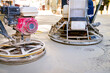 © Roman_23203 - Two types of power trowel with engine, machine for finishing, leveling concrete surface