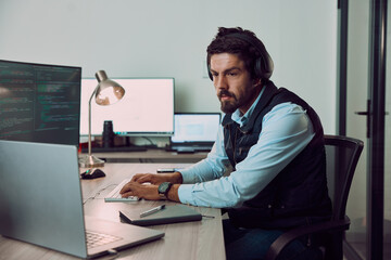 Leinwandbilder - Coding, computer and laptop with man typing, programmer work night for software update, IT and code at desk. Cybersecurity, ux and network with wifi, web design and cyber space with cpu programming