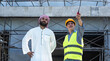 © Jack Tamrong - Engineer Construction man standing at construction site with arab businessman and developer