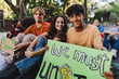 © Jacob Lund - Diverse teenagers sitting at a climate change protest