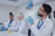 © Kirsten D/peopleimages.com - Science, laboratory and man with blood in test tube for medical research, dna testing and investigation. Biotechnology, teamwork and forensic scientists with sample for analysis, study and experiment