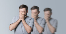 Scared man having hallucination on light grey background. Distorted image