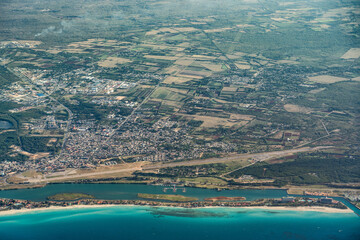 Wall Mural - Aerial Landscape view of area around  Santa Marta in Cuba  with old Santa Marta Airport, Laguna de Paso Malo and a long tropical beach 