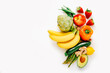 Healthy food background. Different fruits and vegetables on white background.