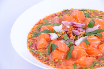 Wall Mural - Spicy Salmon Salad on the white dish.