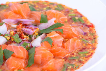 Wall Mural - Spicy Salmon Salad on the white dish.