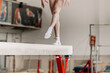 © Real Sports Photos - girl gymnast athlete exercise on balance beam in gymnastics gym