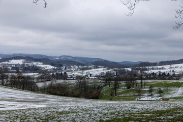 View over the Stettbachtal near Seeheim-Jugenheim in the direction of the Modautal in winter with snow