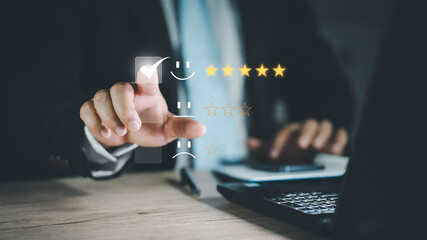  hand of customer or client giving a five star rating. Service rating, Customer service satisfaction survey concept. Business people or customers show satisfaction by pressing face emoticon smile.