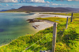 Fototapeta  - The beautiful sandy beach and clear turquoise sea at Seilebost on the isle of Harris in the Western isles of Scotland