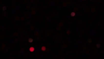 Wall Mural - Small Colorful Blur Light Circles Falling Down and Fading. Amazing Neon Colored Light Leaks Lens Flares Bokeh Motion Effect. 4K abstract animated background or overlay.
