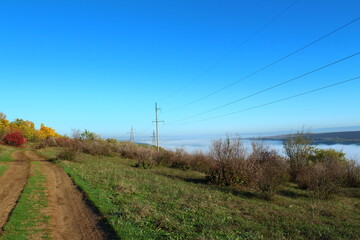 road in the countryside near high voltage lines