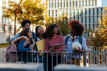 Diverse students socializing on campus.