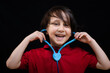 © Cavan Images - Little friendly doctor holding stethoscope ready to examine