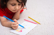 © Cavan Images - Cute little boy drawing  creative drawings at home