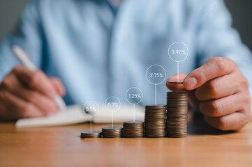 Wall Mural - Investor, trader, investment, fund, stock market, businessman stacking coins different height with percentage for interest rating from differ investment , Financial profit return and dividend concept.