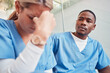 © Courtney/peopleimages.com - Healthcare, collaboration or loss and a sad nurse in the hospital with a man colleague showing compassion. Medical, death and insurance with a black male medicine professional consoling a friend
