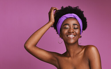 Canvas Print - Portrait, beauty and mockup with a model black woman on a purple background in studio for natural skincare. Face, hair and headband with a young afro female posing to promote cosmetic treatment