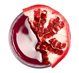 Wall Mural - Pomegranate juice with slice in glass cup isolated on white, top view