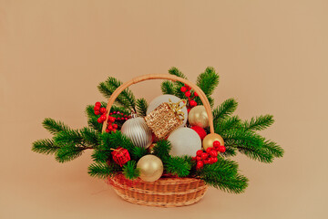 Gift basket for Christmas cards with Christmas tree toys, cones and accessories.Snow maiden.Christmas tree.decor, with a Christmas tree and toys,a figure of Santa Claus.ON AN ISOLATED WHITE BACKGROUND