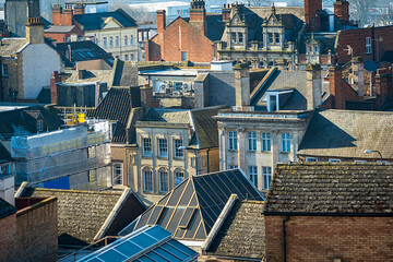 Aerial view over buildings and houses roofs in england uk