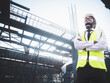 © arrowsmith2 - African architects engineer man with hardhat work together in the inside the construction building site.Engineering concepts .