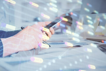 Fototapete - Multi exposure of man's hands holding and using a digital device and data theme drawing. Innovation concept.