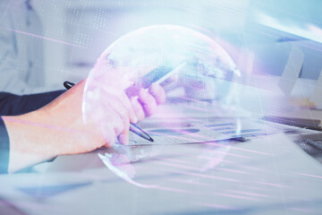 Fototapete - Double exposure of man's hands holding and using a digital device and tech theme hologram drawing. Technology concept.