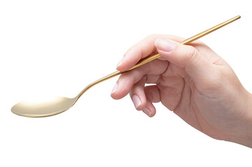 isolated of a woman's hand holding a steel spoon.