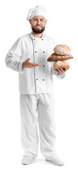 Canvas Print - Male baker with loaves of fresh bread on white background