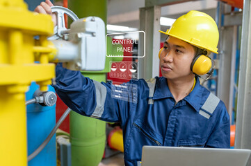 Wall Mural - Maintenance technician at a heating plant,Petrochemical workers supervise the operation of gas and oil pipelines in the factory,Engineers put hearing protector At room with many pipes