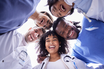 Doctor, group portrait and below circle for motivation, support and collaboration with smile, solidarity and diversity. Friends, doctors and face with teamwork, goals and help in healthcare at clinic