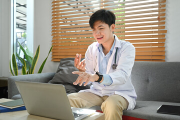 Doctor giving online consultation for domestic health treatment, talking to online patient on laptop. Telemedicine concept