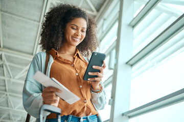 Wall Mural - Black woman at airport, travel with smartphone and plane ticket, communication and check social media with smile. Notification, email or chat with technology, ready for flight and happy for adventure