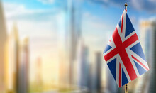 Small Flags Of The United Kingdom On An Abstract Blurry Background