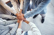 © Allistair F/peopleimages.com - Diversity, stack of hands and business people in the office in unity, collaboration and teamwork. Multiracial, corporate and professional team with motivation, support and connection in the workplace