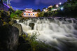 waterfall in the Hwaseong Fortress at night in Suwon, South Korea.