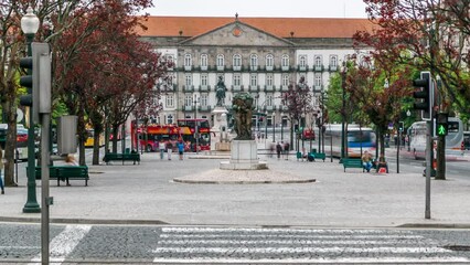 Wall Mural - The Liberty Square in the historic centre of Porto timelapse. Zebra crossing over the road. Porto is one of the most popular tourist destinations in Europe.