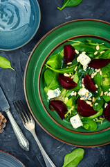 Wall Mural - Meatless salad with beet, cheese and pine nuts,top view