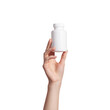 Young female hand holding blank white squeeze bottle plastic tube on transparent background. Packaging for pill, capsule or supplement. Product branding mockup
